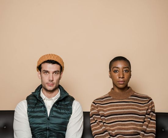 Man in a calm yet strong pose reflecting energy